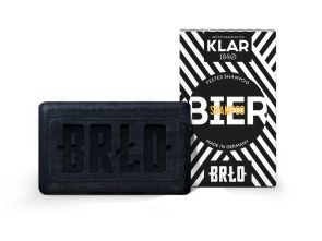 Festes Biershampoo in schwarzer Verpackung